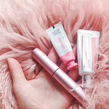 Beauty products on faux fur